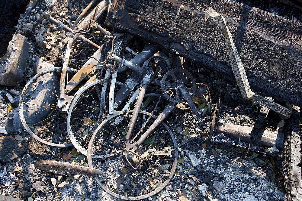 Charred remains of homes which were burned to the ground stand in a neighborhood of Rancho Bernardo in San Diego during the Southern California wildfires of 2007. More than a dozen homes were completely lost in the small neighborhood there.