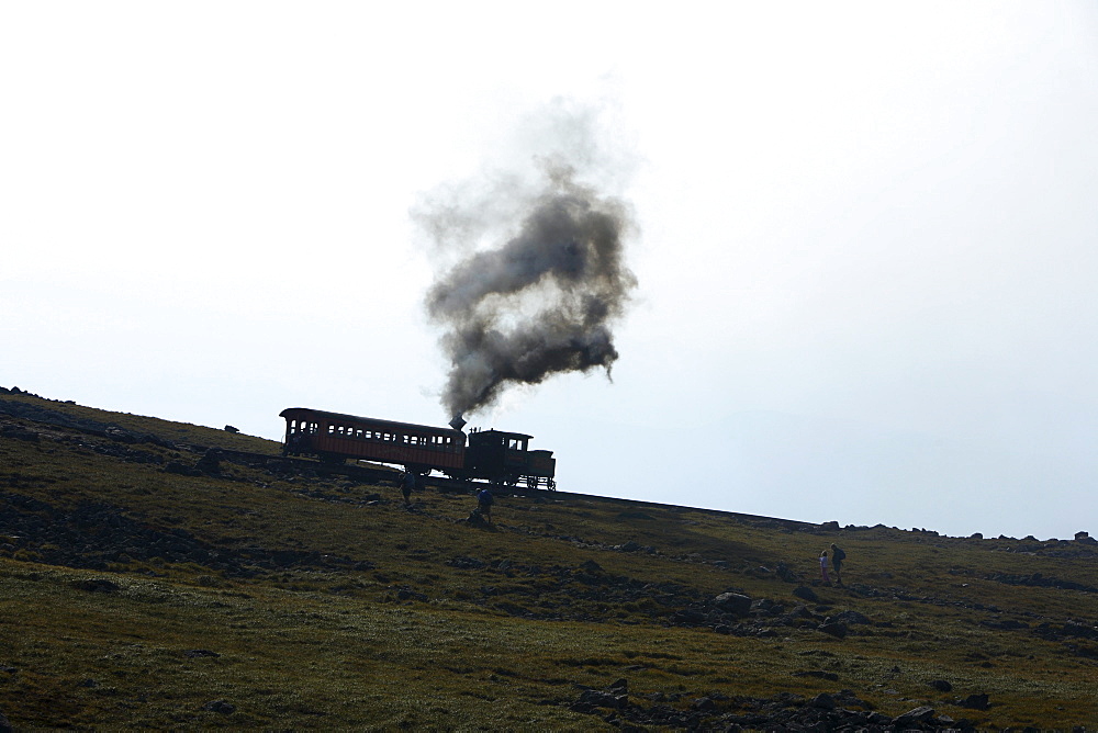 The Mt. Washington Cog Railway makes its way to the summit of Mt Washington just north of North Conway, NH.