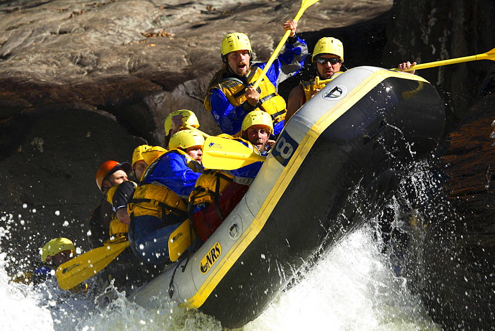 Unknown whitewater rafters crashing through Pillow Rock rapid on the Upper Gauley river near Fayetteville, WV