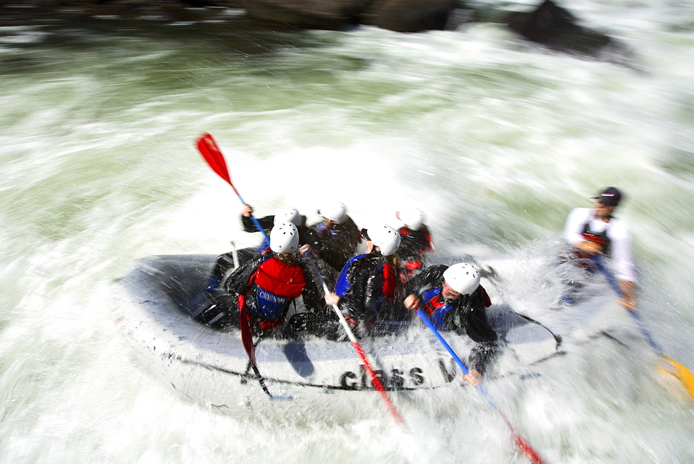 Pan blur image of unknown rafters roll through the infamous Pillow Rock rapid on the Upper Gauley River near Fayetteville, WV