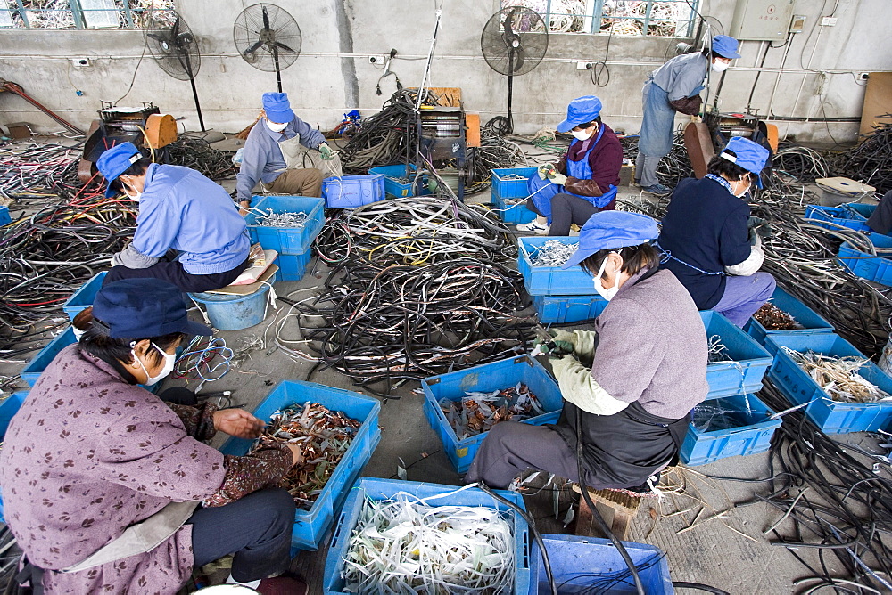 Taicang Port Imported Recyclable Resources Processing Zone, near Shanghai, China. This is a development project of the government to encourage business in recycling of metals and plastics, some of which comes from electronics.