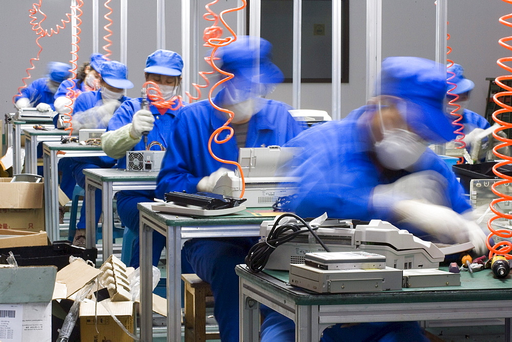 Seven workers are disassembling computers at TES-AMM Shanghai, which was founded on September 21, 2005, currently has 67 employees of which 26 are workers. With an annual production capacity of 10,000 tons, it has only treated 2,000 tons of e-waste from its founding more than a year ago. 'The biggest problem is that there isn't an e-waste recycling channel in China. The biggest chunks of raw materials we get are from government bodies, which are upgrading their equipments, and electronic appliances franchises that are washing out their outdated inventories. We don't have any imported e-waste because that's banned by the government. It takes a worker no more than ten minutes to disassemble a computer, and each worker can deal with between 60 to 70 computers a day,' says Janice Wu, who's the Environment & Quality Management Dept. Manager and Plant Manager Assistant.