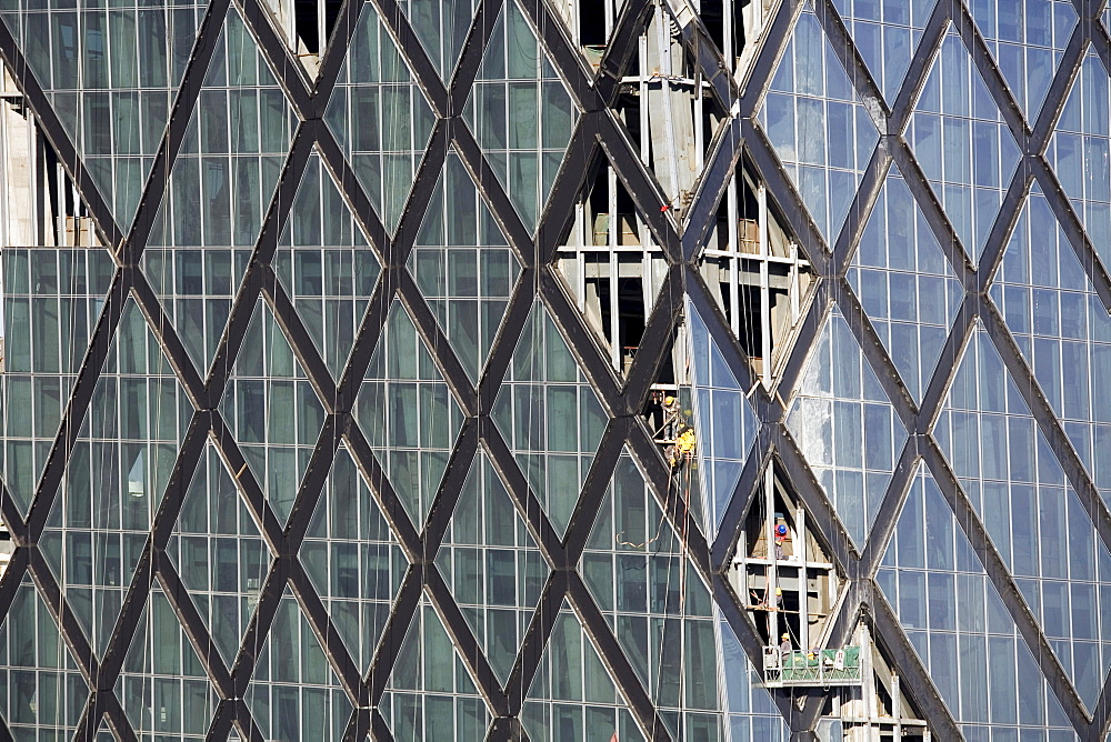 The China Central Television Building under construction in Beijing, China. The imposing building was designed by Dutch architect Rem Koolhaas,  cost an estimated US $600million, and is scheduled be completed in time for the Beijing Olympics in 2008.