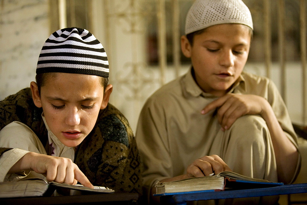 Young boys study the Koran at a madrassa in Karachi, Pakistan on February 1, 2008.