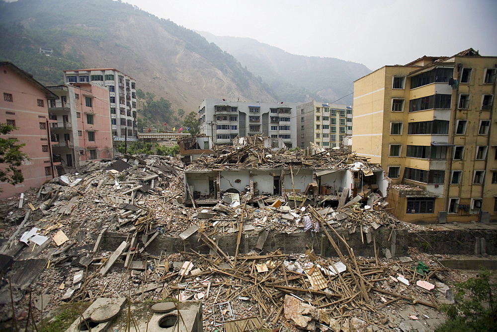 Sichuan earthquake. The Chinese government raised the death toll to 21,500 but has said fatalities could rise above 50,000. Tens of thousands could still be buried in collapsed buildings in Sichuan province, where the quake was centered,