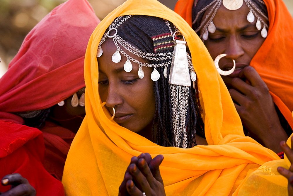 Shanabla woman sings at a wedding celebration near El Obeid, Sudan. A nomadic tribe they raise camels.