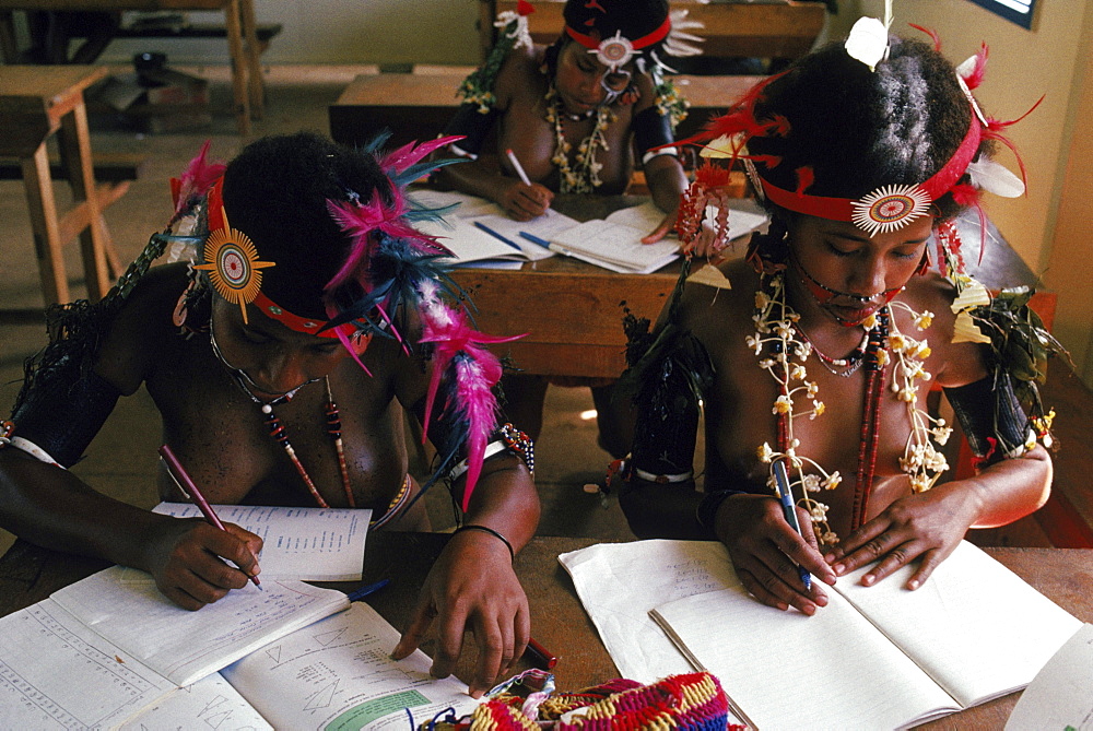 Various classroom situations at several different schools. Every other Friday is culture day when the students come to school in tradional dress.