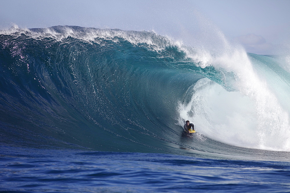 A man bodyboarding at Shipstern Bluff, Tasmania