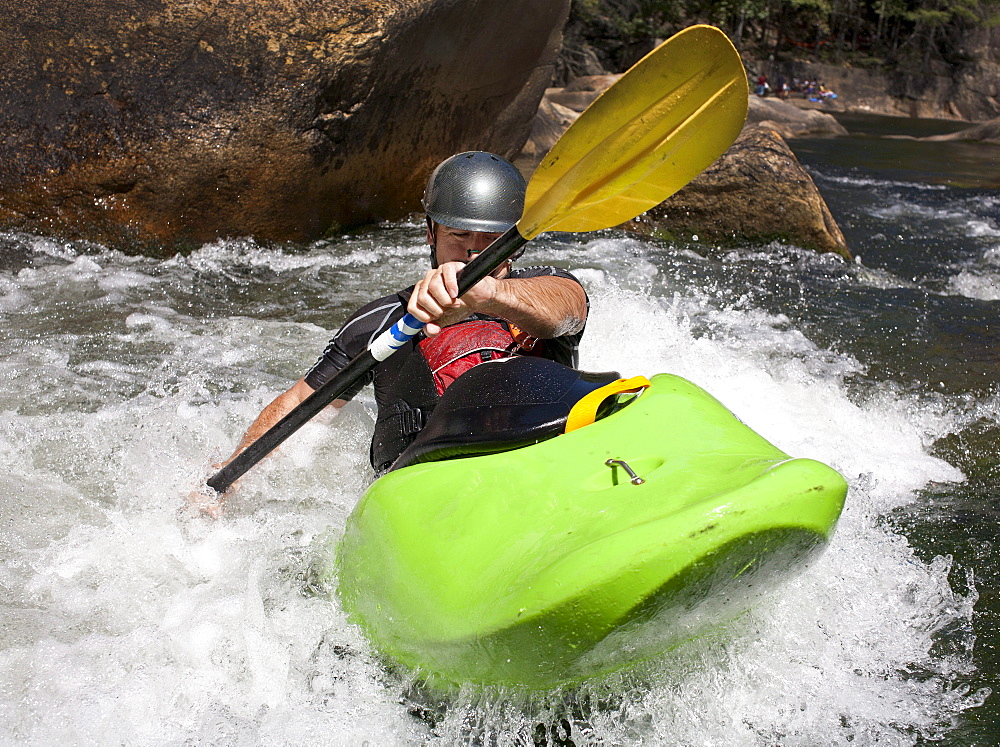 Man kayaks in whitewater rapids on Wilson Creek, NC.