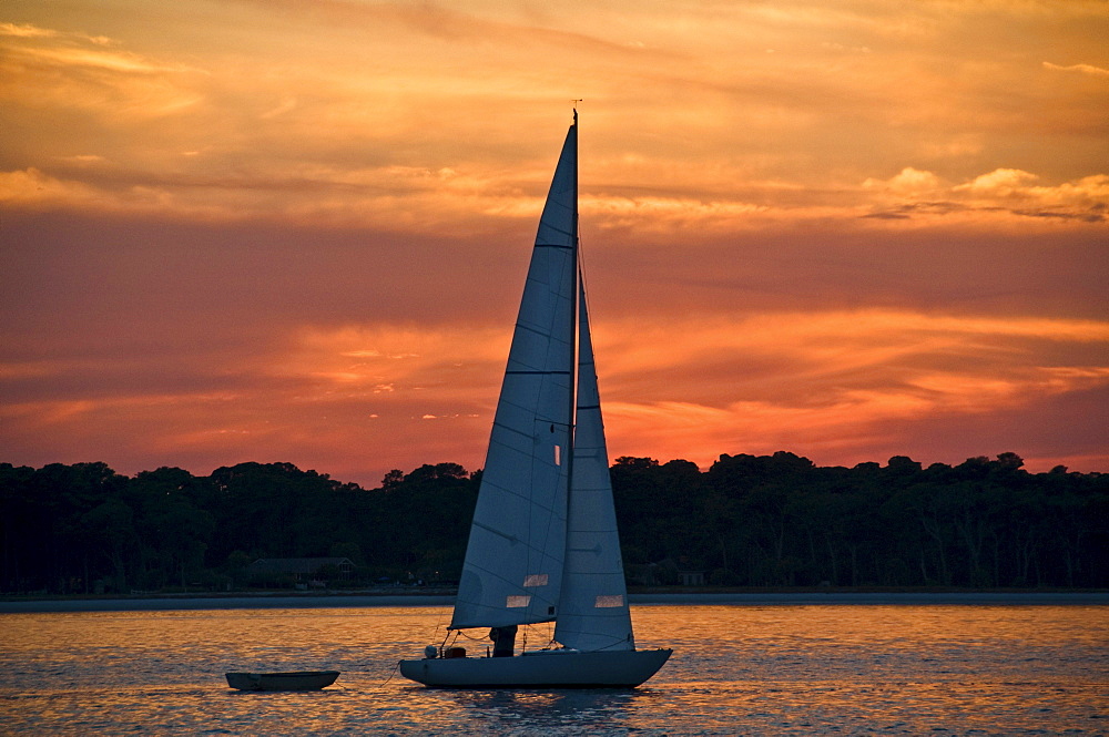 A sailboat at sunset on Hilton Head Island, South Carolina.