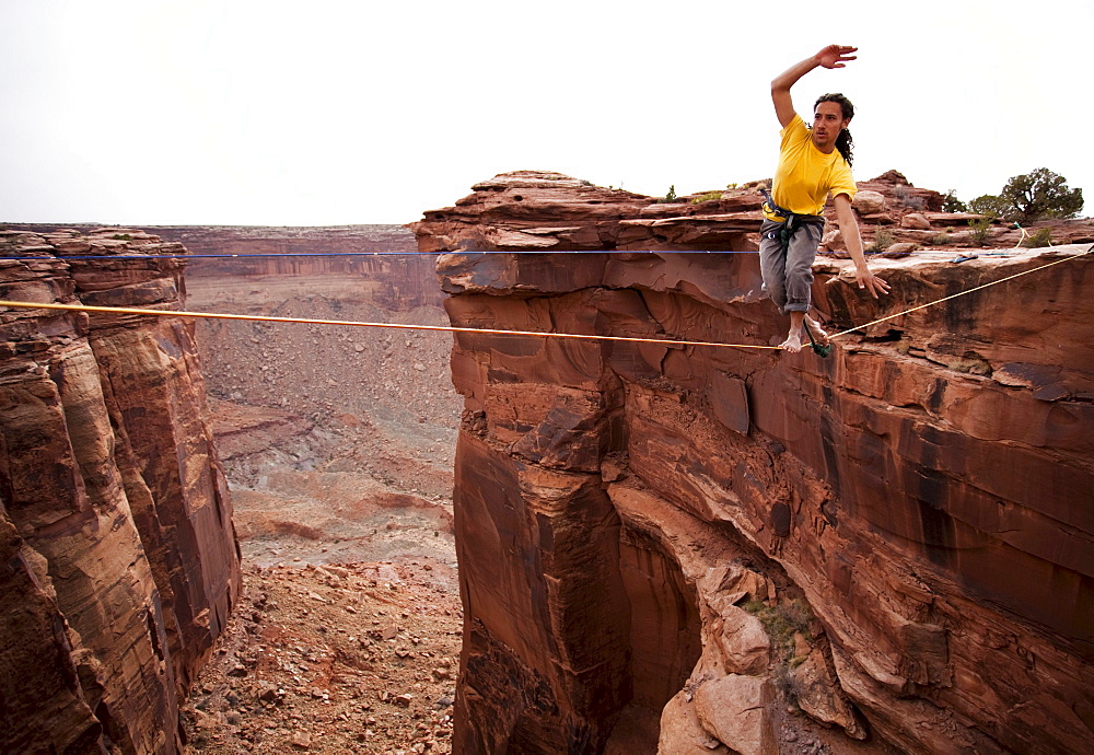 Highlining at the Fruit Bowl in Moab, Utah.