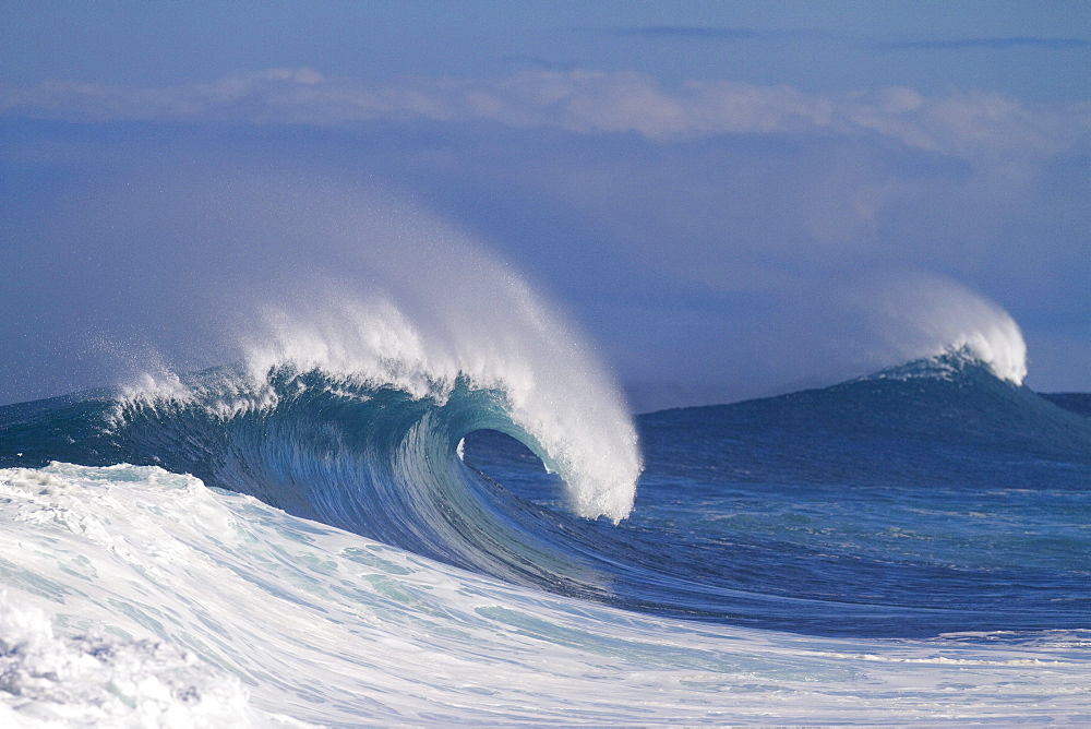 A wave breaking at Off The Wall in Hawaii.