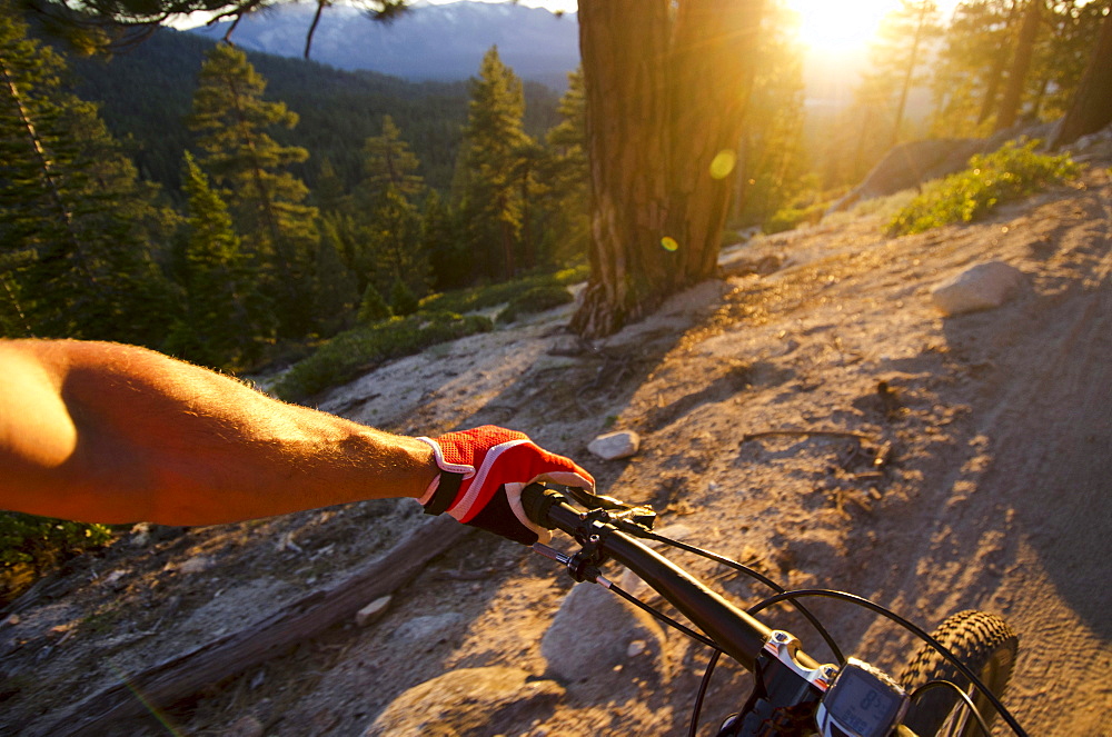 Jake Dore mountain biking on the Corral Trail in Lake Tahoe, California.