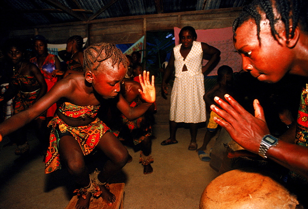 Aucaner Maroon people dancing in Poketie village on Tapanahoni River in central Suriname.