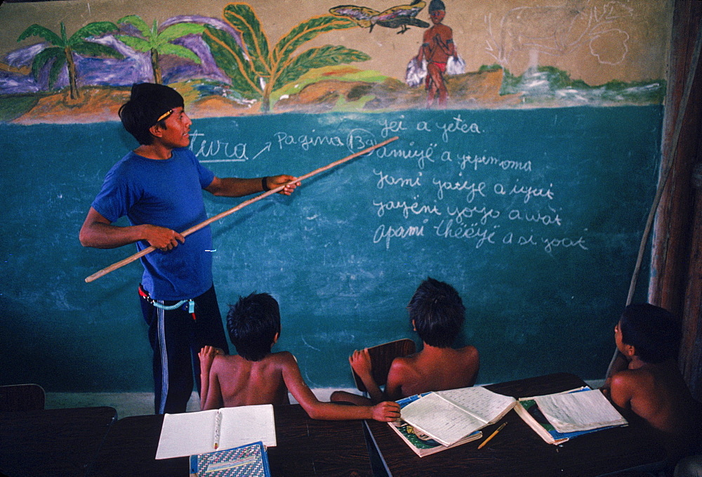 Yanomami Indian children at the Catholic mission school at Mavaca on the Upper Orinoco River. In the Amazonian Forest in southern Venezuela.