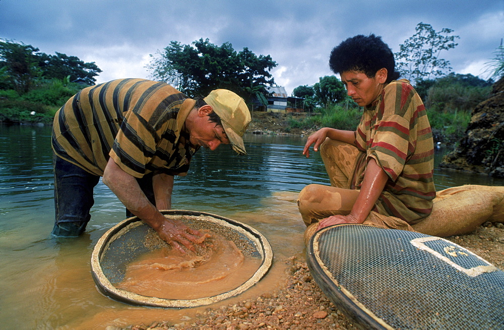 Diamond miners panning near Salvacion, Venezuela, South America.