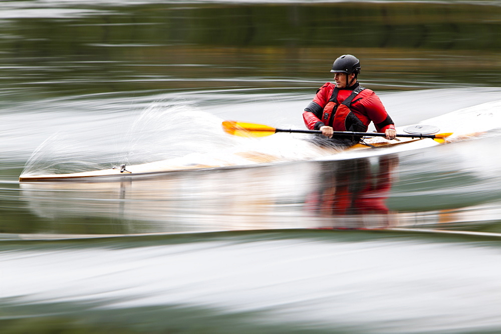 Tom Glass surfs the Skookumchuck in his wooden Cedar Strip Kayak.