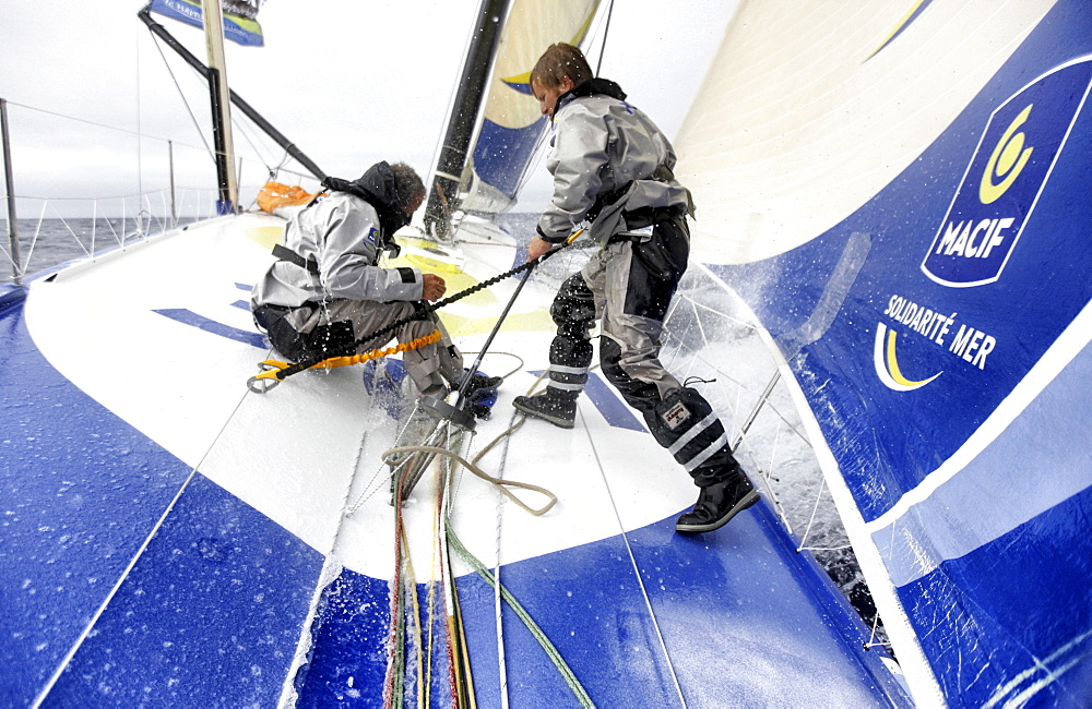 Onboard the IMOCA Open 60 Macif crewed by Francois Gabart and Michel Desjoyeaux during a training session before the Transat Jacques Vabre in the English Channel from Plymouth to Port la Foret after she won on her class the Rolex Fastnet Race.