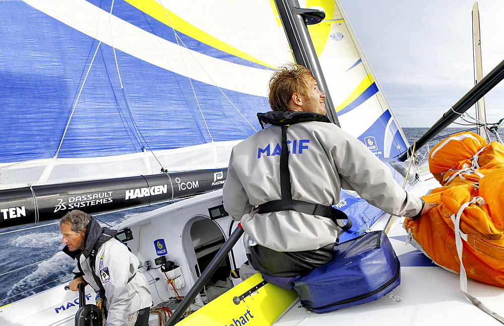 Onboard the IMOCA Open 60 Macif crewed by Francois Gabart and Michel Desjoyeaux during a training session before the Transat Jacques Vabre in the English Channel from Plymouth to Port la Foret after she won on her class the Rolex Fastnet Race.