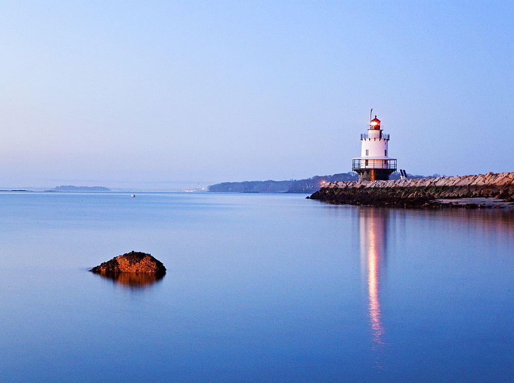 Maine's Spring Point lighthouse, near the entrance to Portland Harbor, is seen at twighlight.