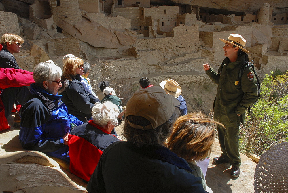 A Park Ranger gives a cultural tour to visitors at Mesa Verde National Park, a native merican site knowen for it's expansive cliff dwellings, in Southwest Colorado.