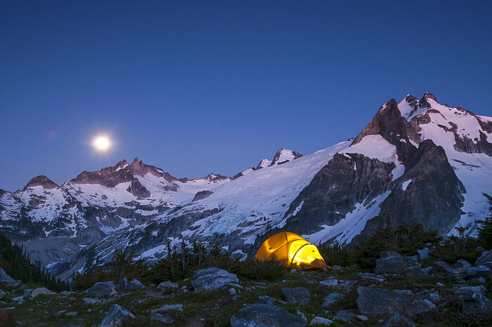 Glowing tent at dusk, White Rock Lakes along the Ptarmigan Traverse, North Cascades, Washington