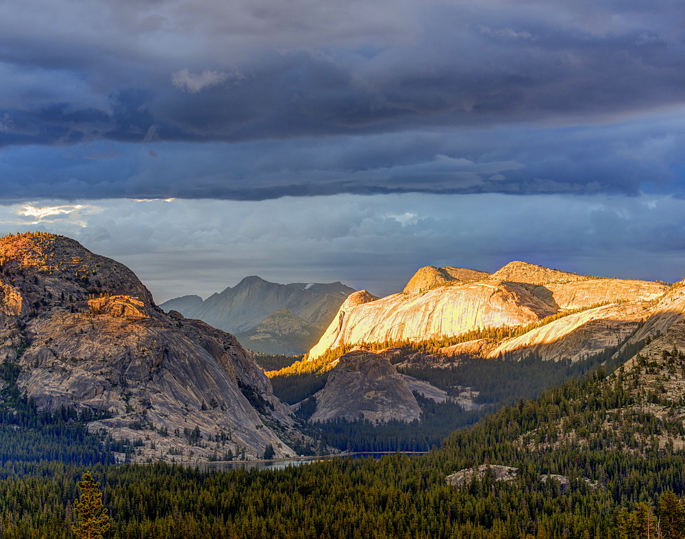 Stormy sunet light over Tenaya Lake along Tioga Pass road, Yosemite National Park