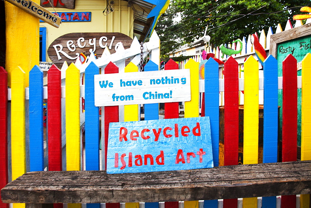 Sign outside The Rusty Fish, a souvenir shop selling craft items made from island scrap.