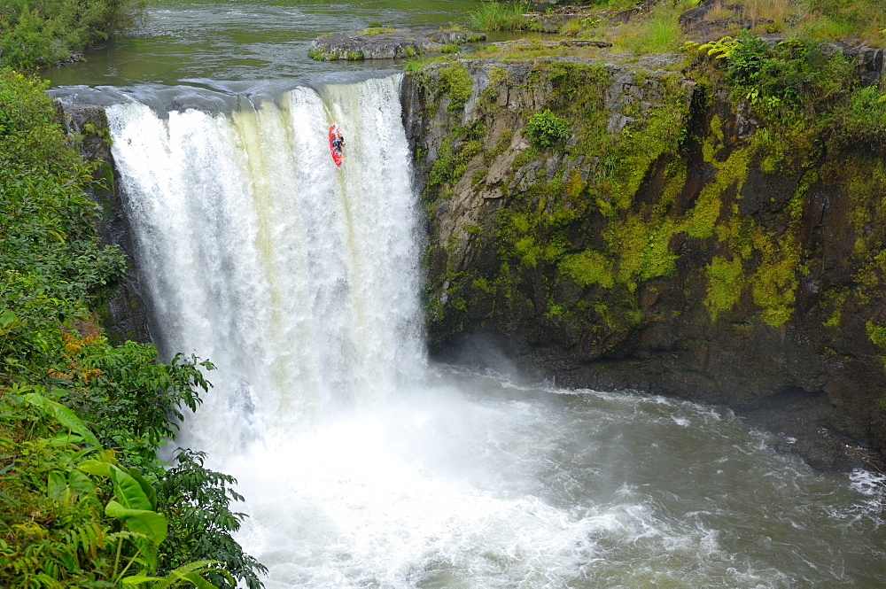 A man kayaks down a waterfall on the Alseseca River in the Veracruz region of Mexico, United States of America