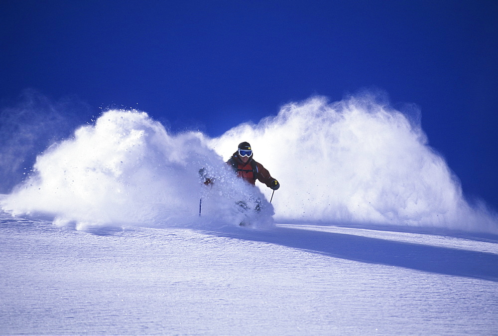 Chris Davenport skiing powder at Snowmass, Colorado, United States of America