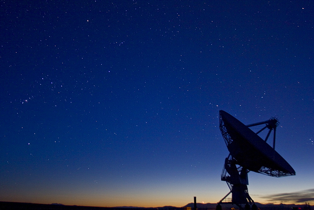 National Radio Astronomy Observatory (NRAO) satellite under the desert night sky. Photo by Thomas Kranzle, United States of America