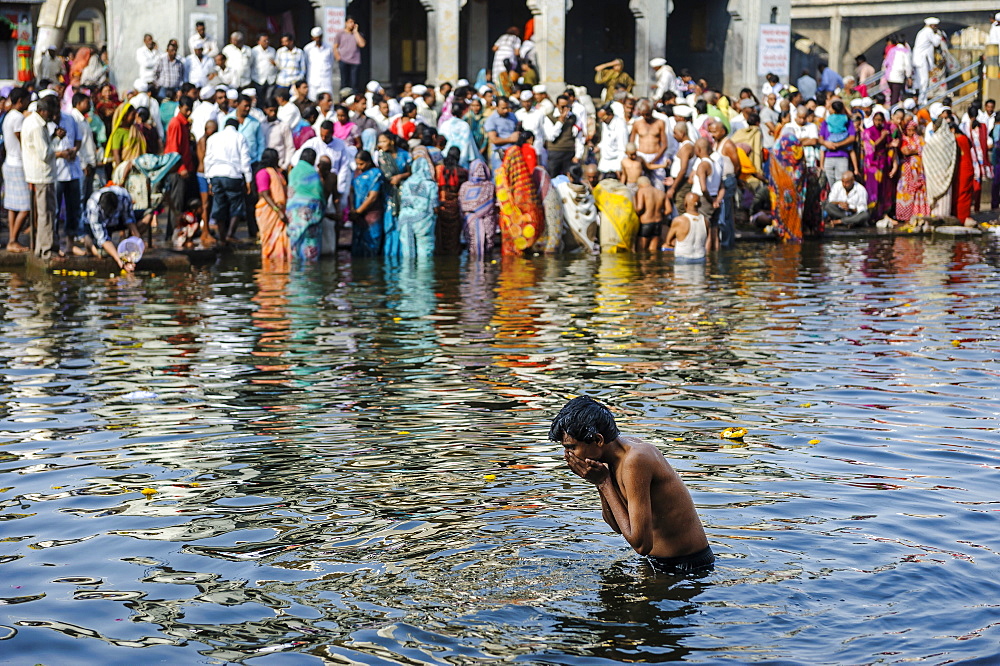 Pilgrims and devotees at Godavari river, Nashik, Maharashtra, India.