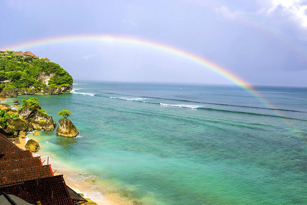 Rainbow over ocean,Bingin beach,Bali,Indonesia.