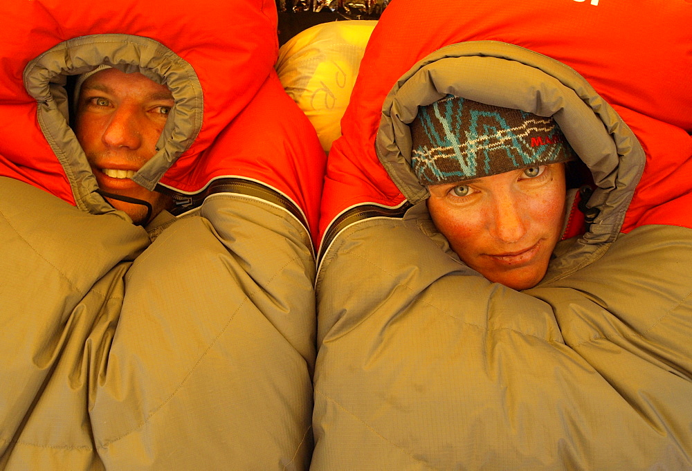 Manaslu mountaineering expedition 2008, Nepal Himalayas: Two mountaineers in their sleeping bags in camp one at 6100 meter altit