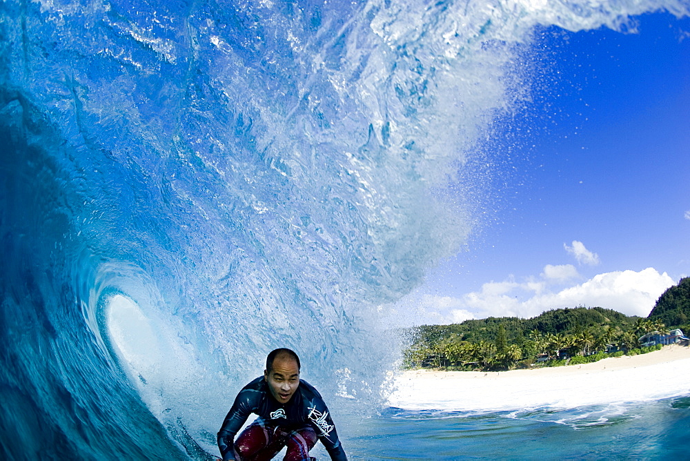 water view of surfing at Off The Wall, north shore,