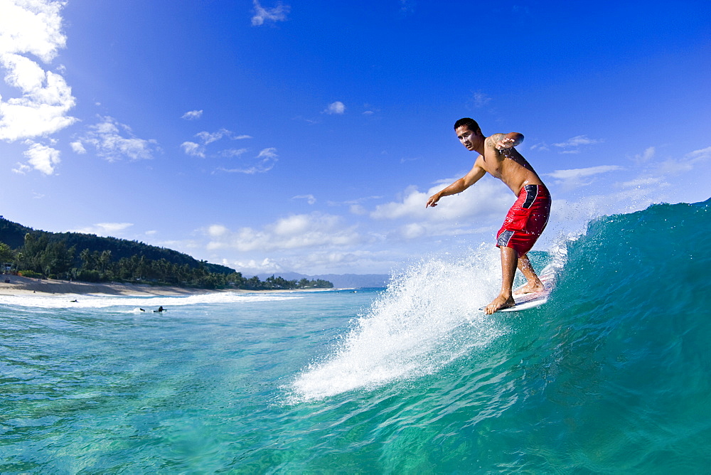 Longboard surfing at Pupukea, north shore,