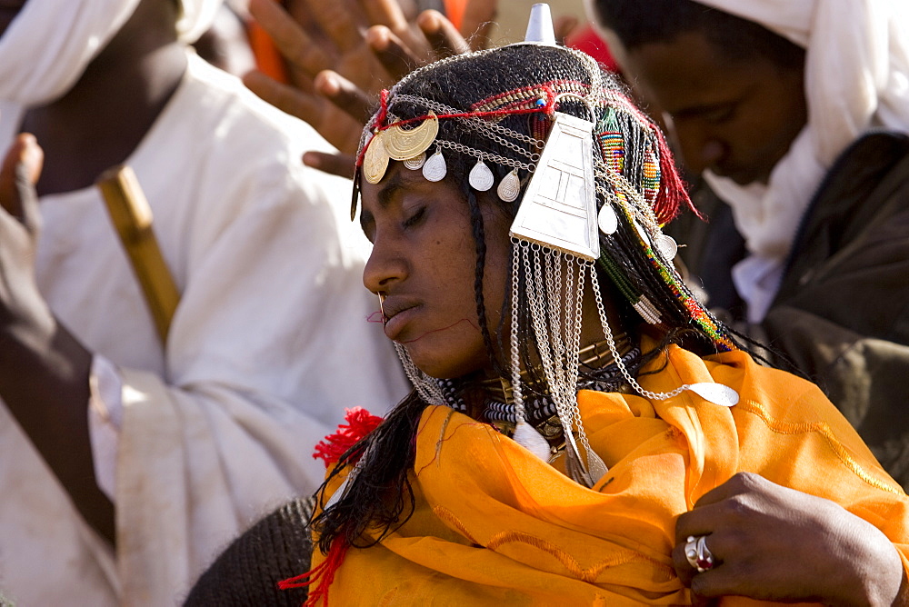 Shanabla woman dances  at a wedding celebration near El Obeid, North Kordofan, Sudan. A nomadic tribe they raise camels.