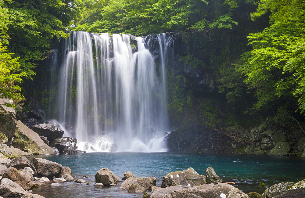 Waterfall at Cheonjeyeon falls on Jeju Island