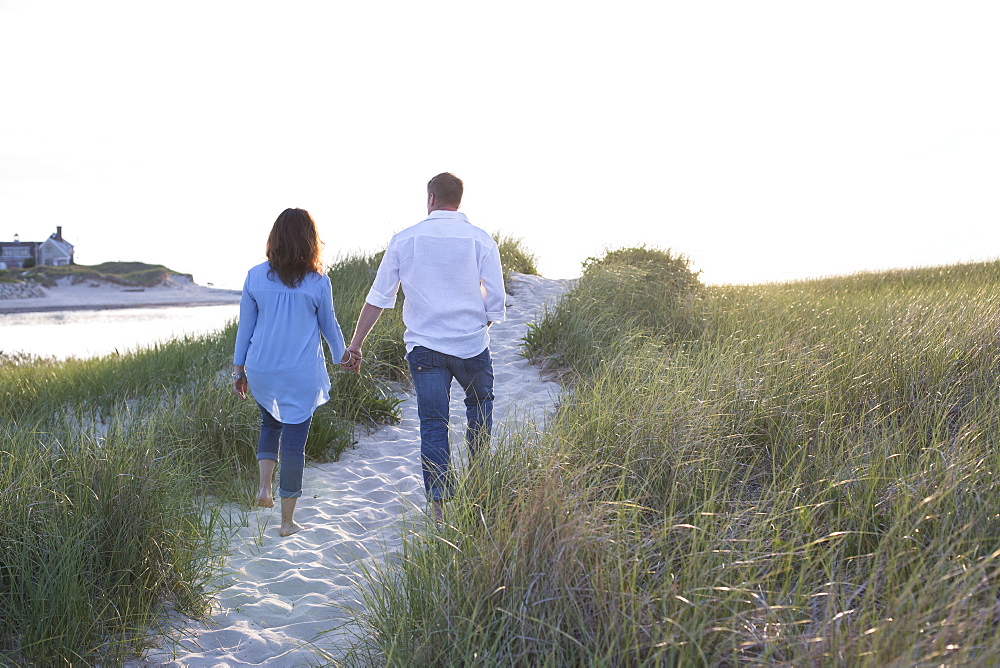 A couple are photographed at a Cape Cod beach, Dennis, Massachusetts, United States of America