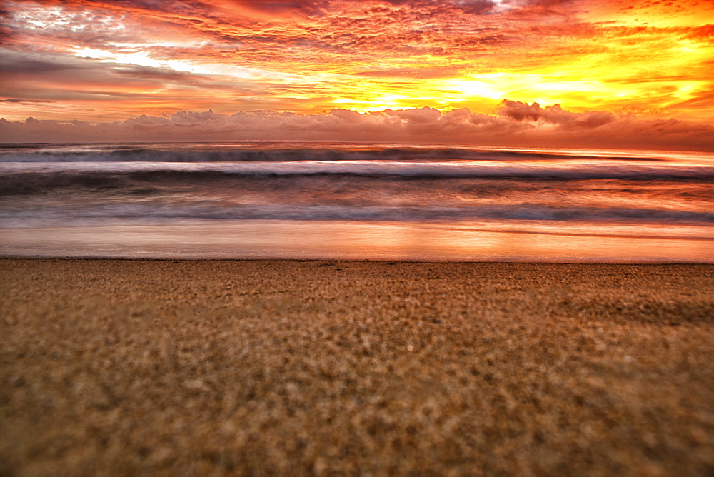 Golden Sunrise over the Indian Ocean at Nilaveli near Trincomalee on Sri Lanka's East Coast.