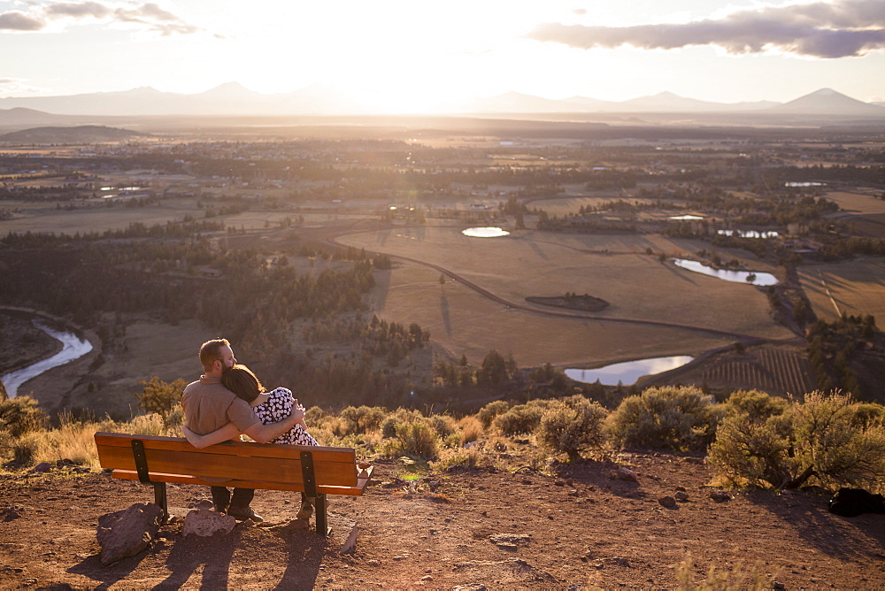 Lifestyle portrait of an engaged couple that loves the outdoors at Smith Rock State Park in Central Oregon.