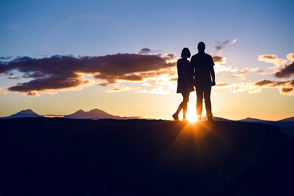 Lifestyle portrait of an engaged couple that loves the outdoors at Smith Rock State Park in Central Oregon.