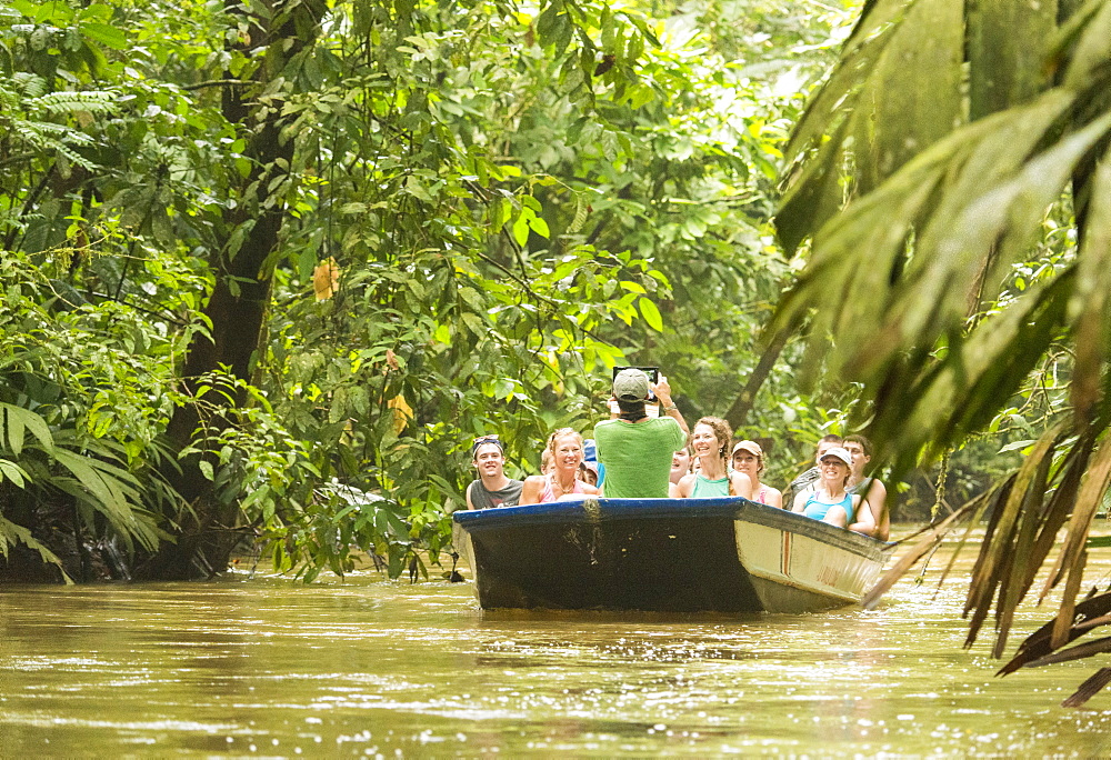 Tourists exploring the canals of Tortugaro National Park by boat, Costa Rica