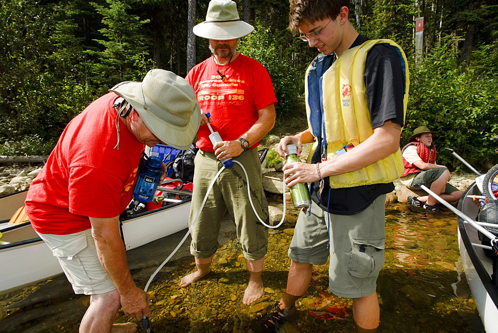 Boy Scouts canoeing on the Bowron Lakes circuit. Bowron Lakes Provincial Park. Quesnel, British Columbia