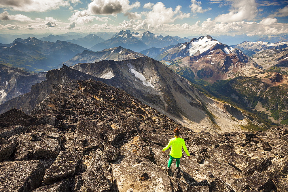 Female Climber Descends From Rocky Ridge On Mount Marriott