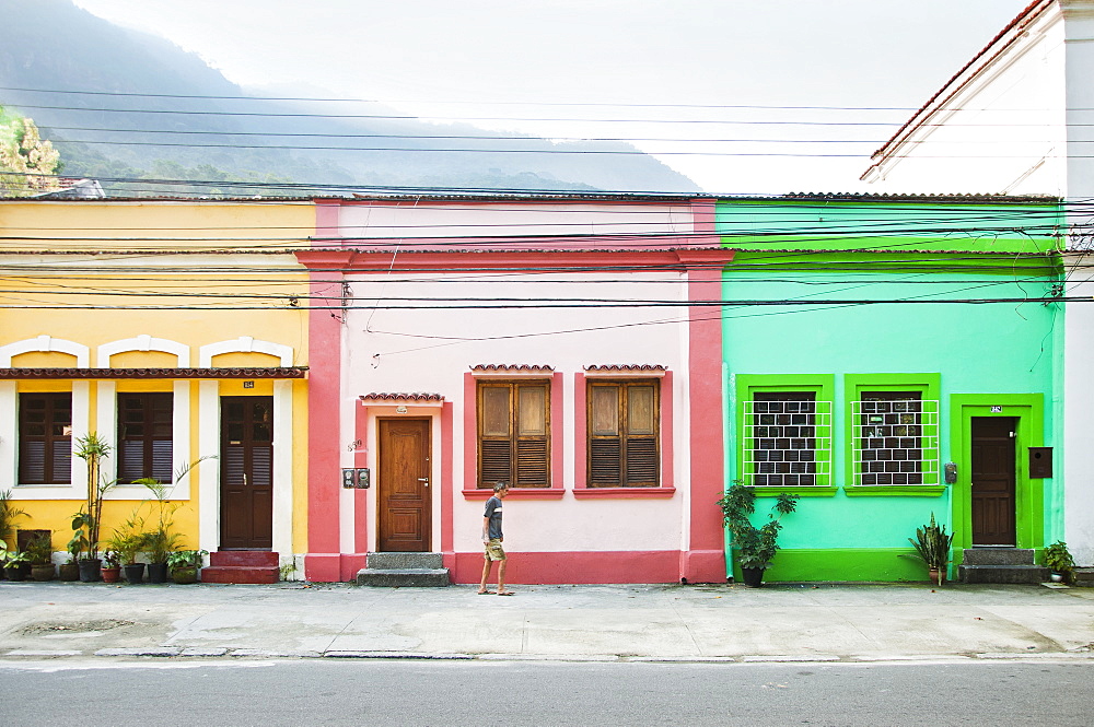 Three colorful townhomes in the mountains of Rio de Janeiro, Brazil