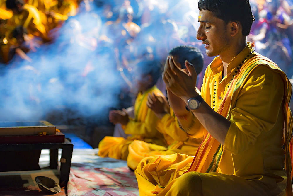 The faithful perform Ganga Aarti at the Parmarth Niketan Ashram in Rishikesh, Uttarakhand, India