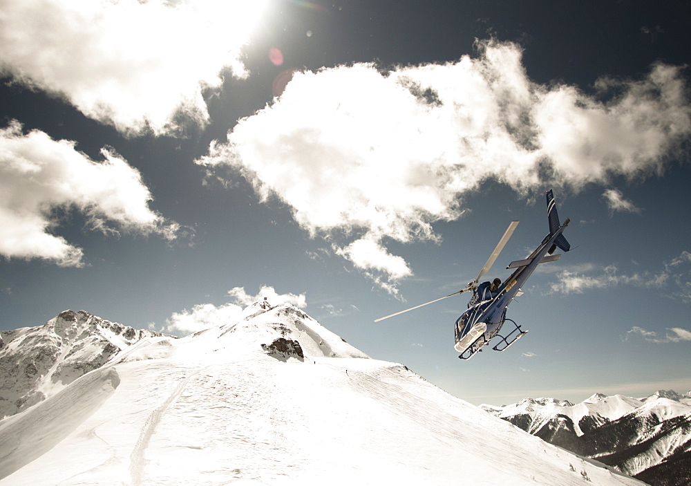 Helicopter Flying Over Silverton Mountain Ski Resort
