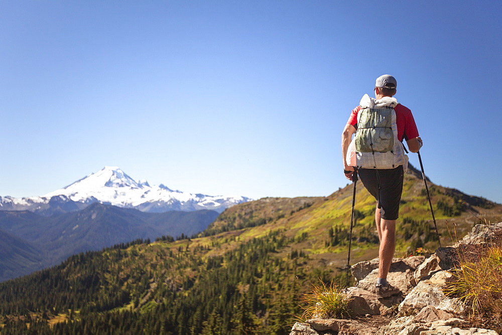 Male Hiker In North Cascades National Park With The View Of Mount Baker