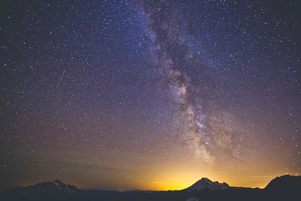 The Milky Way Galaxy Displayed Above Mount Baker As Seen From North Cascades National Park